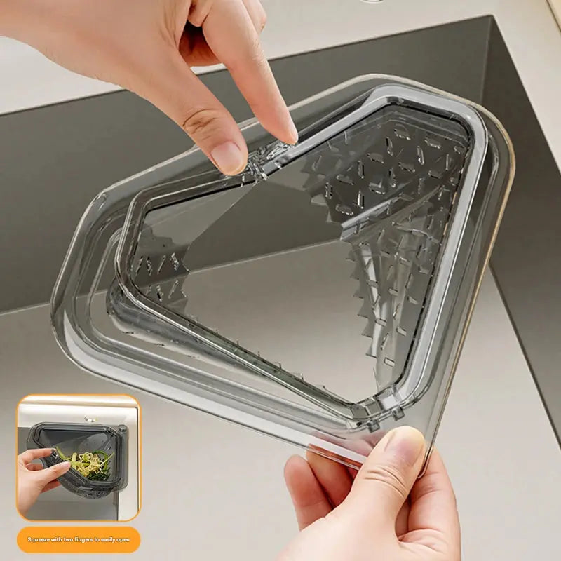 Magnetic draining triangular kitchen sink filter